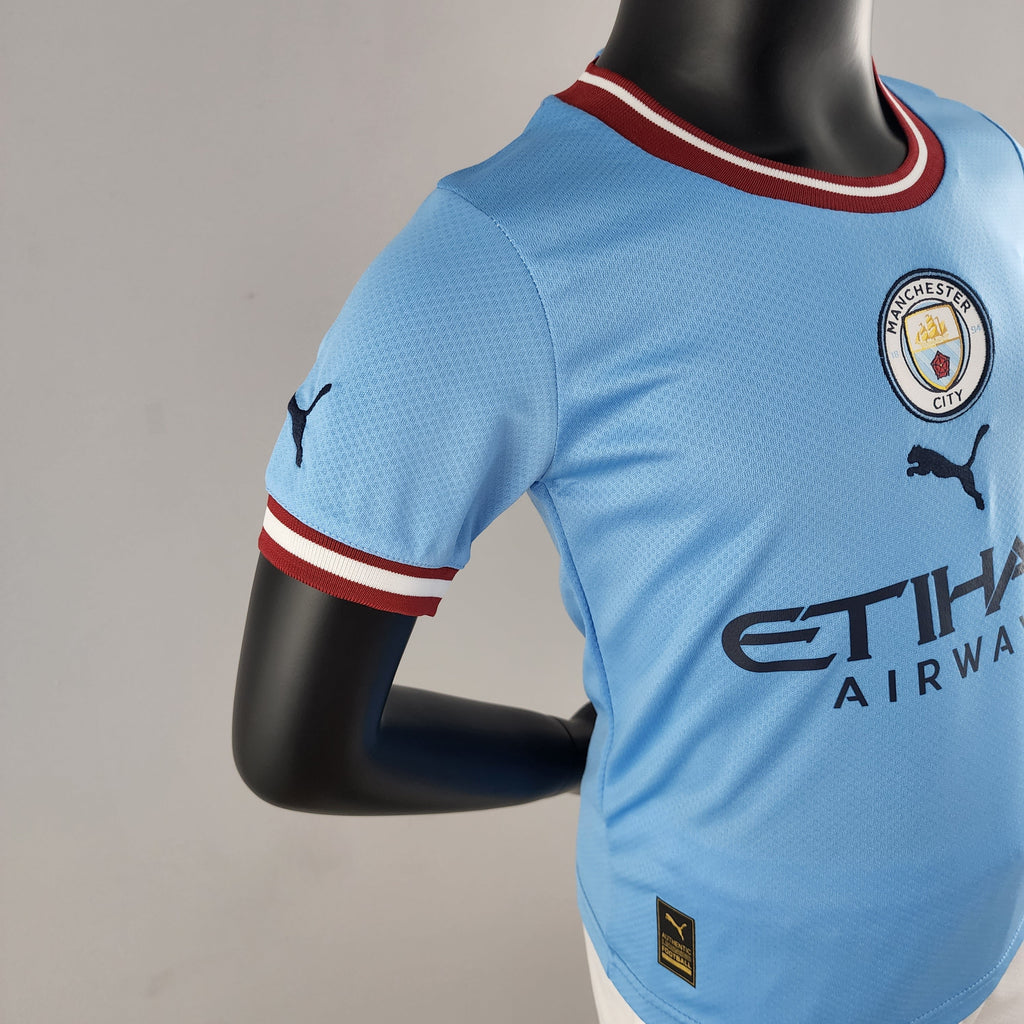Manchester City 2022/23 Primera equipación (Mini Conjunto)
